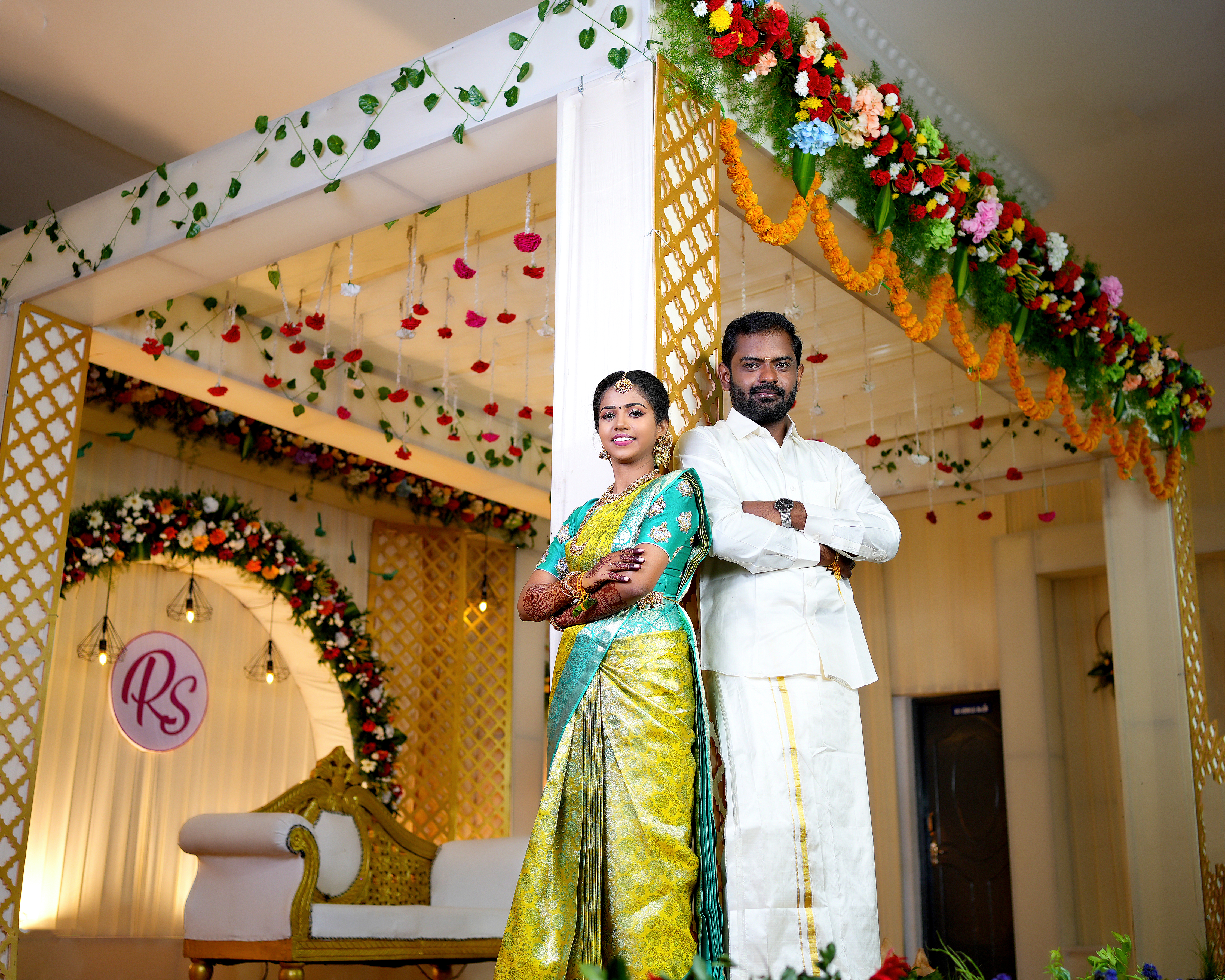 Romantic couple walking through gardens